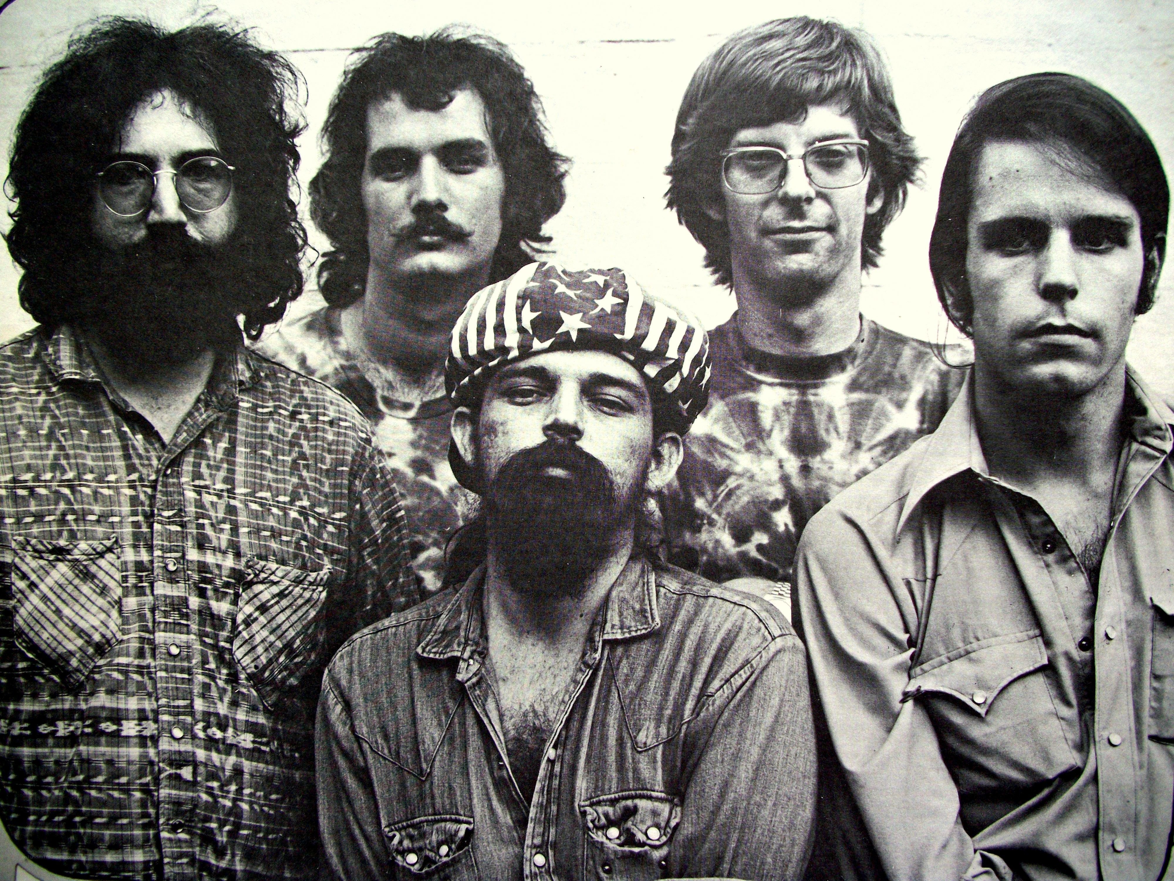 band photo of five men
