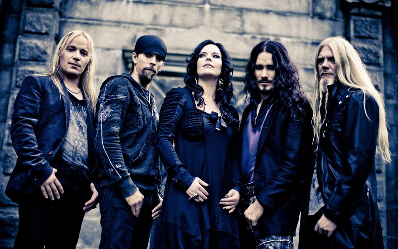 band photo of five musicians