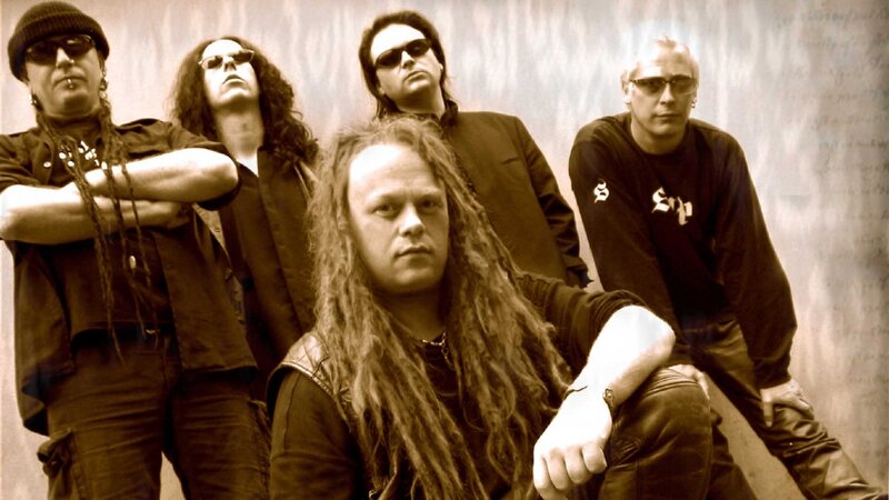band photo of five musicians