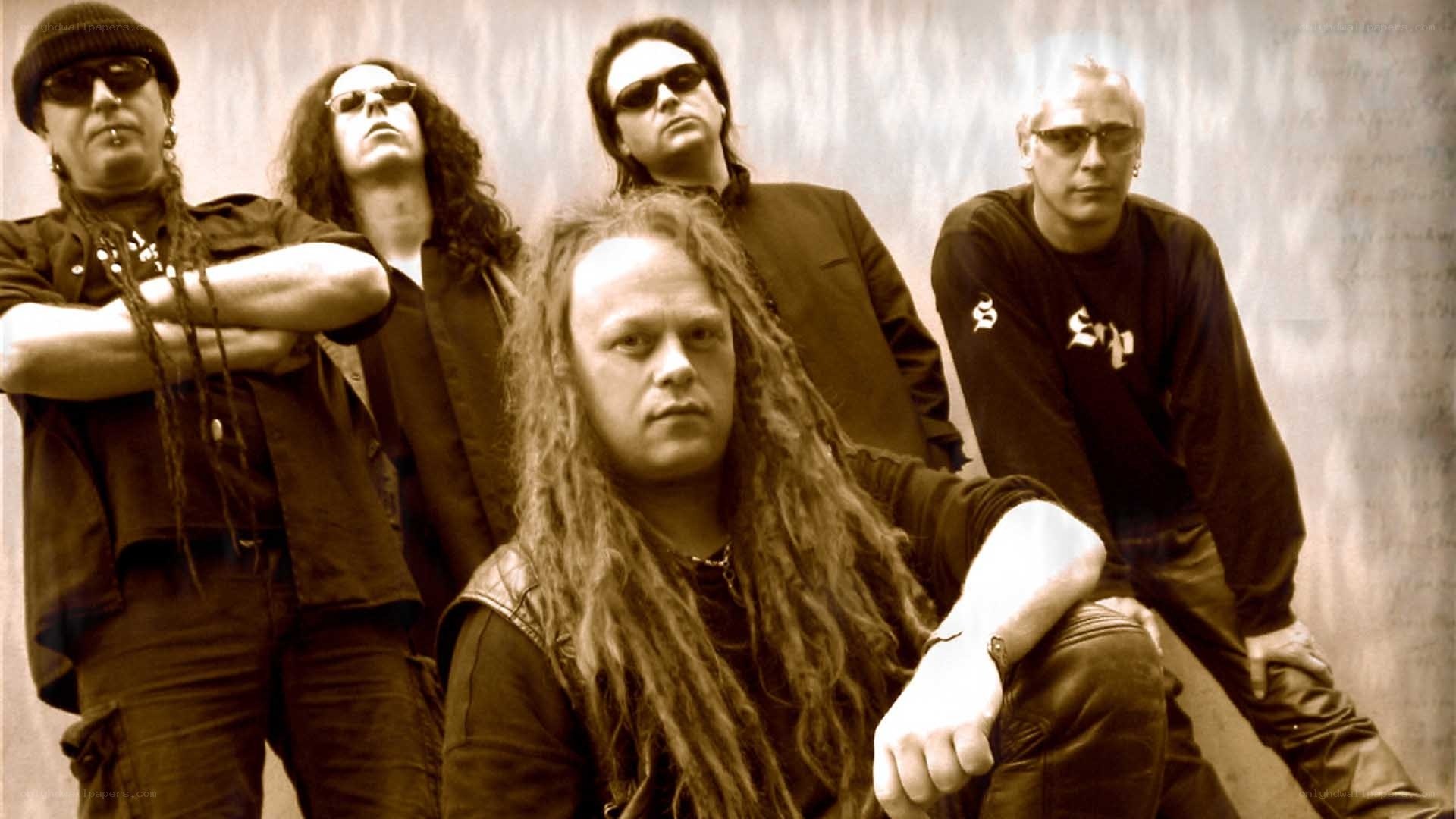 band photo of five musicians