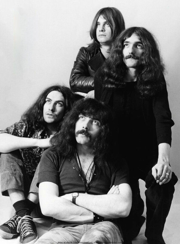 band photo of four men