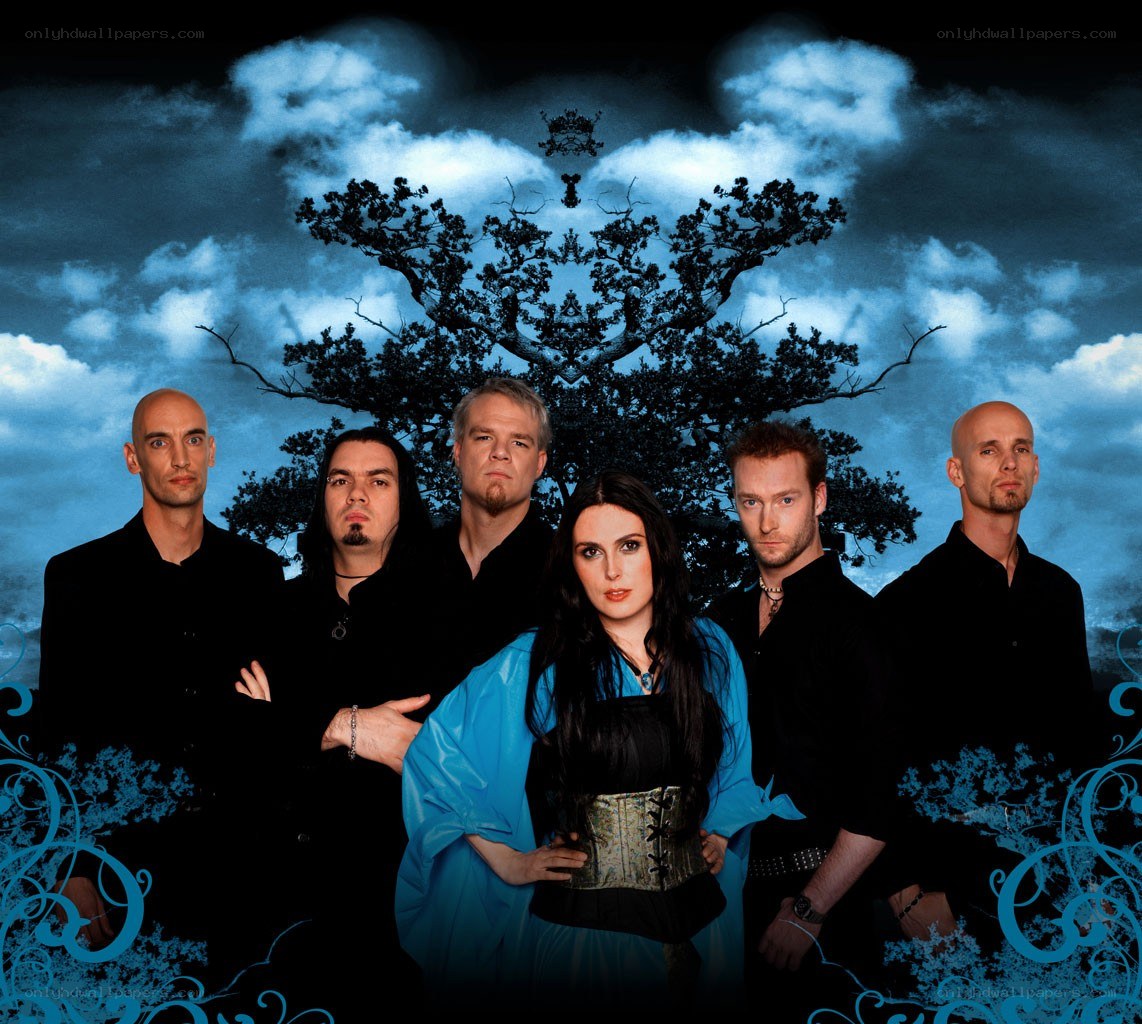 band photo with blue tree backdrop