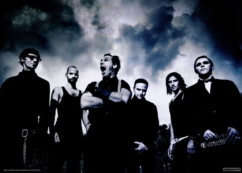 band photo with dramatic sky
