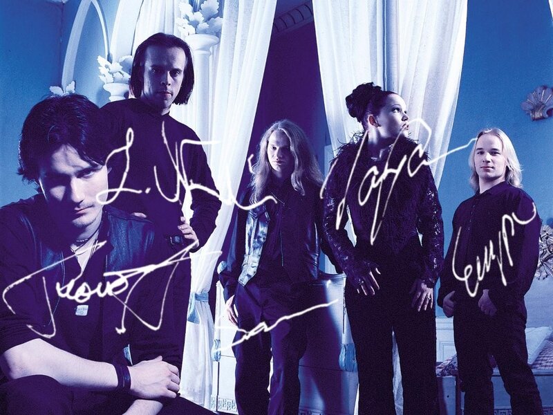 band photo with signatures