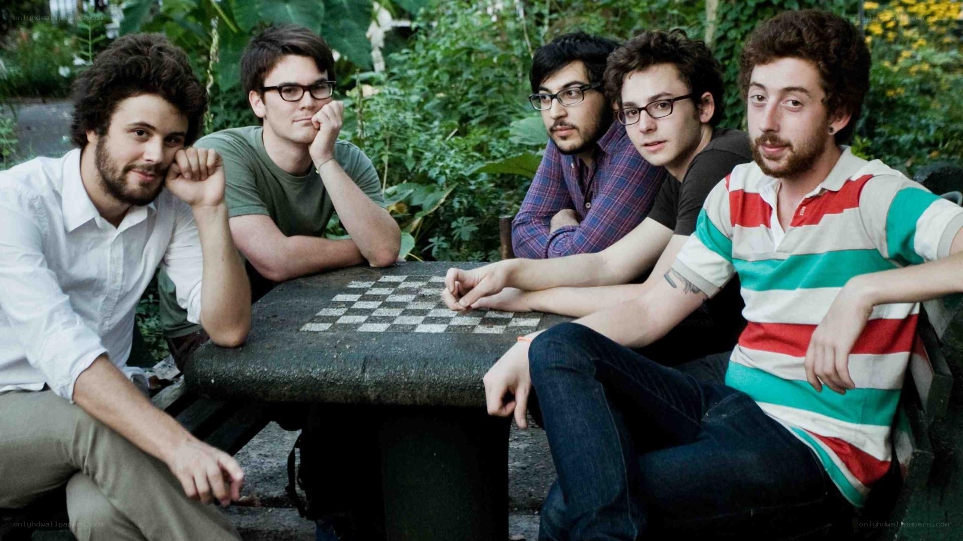 band playing chess outdoors