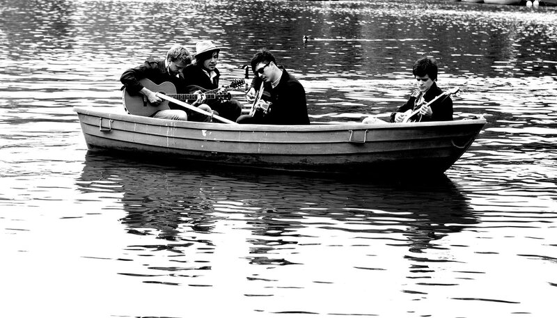 band playing in a boat