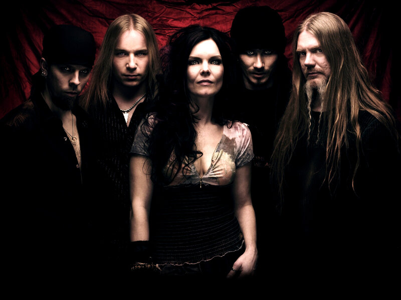 band portrait with red backdrop