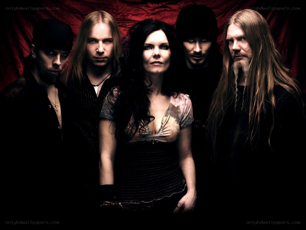 band portrait with red backdrop