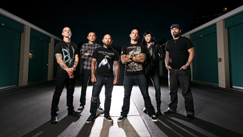 band posing at night