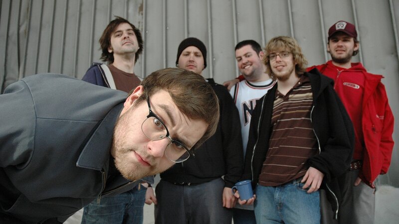 band posing for photo