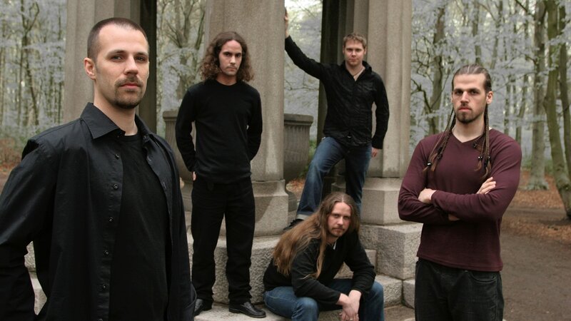 band posing in forest