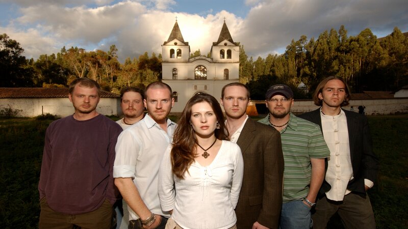 band posing in front of church