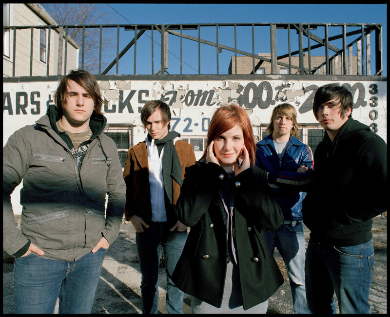 band posing in urban setting