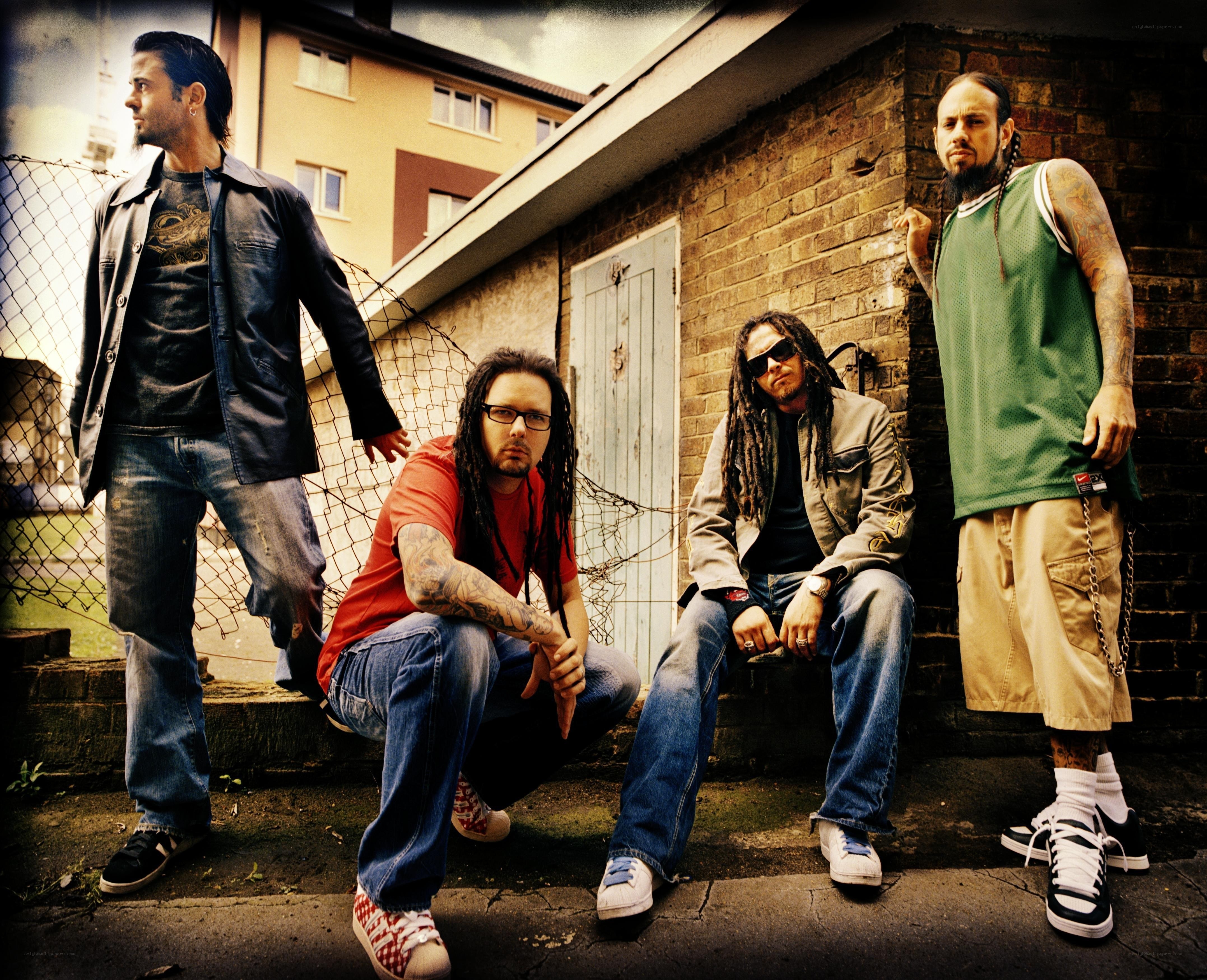 band posing in urban setting