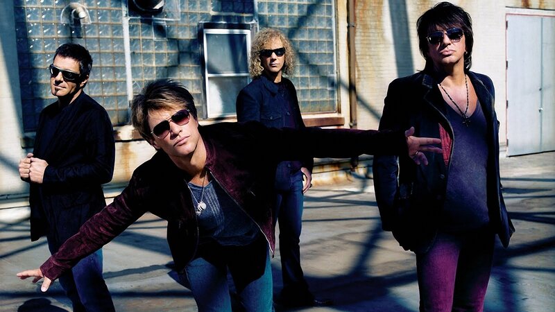 band posing in urban setting