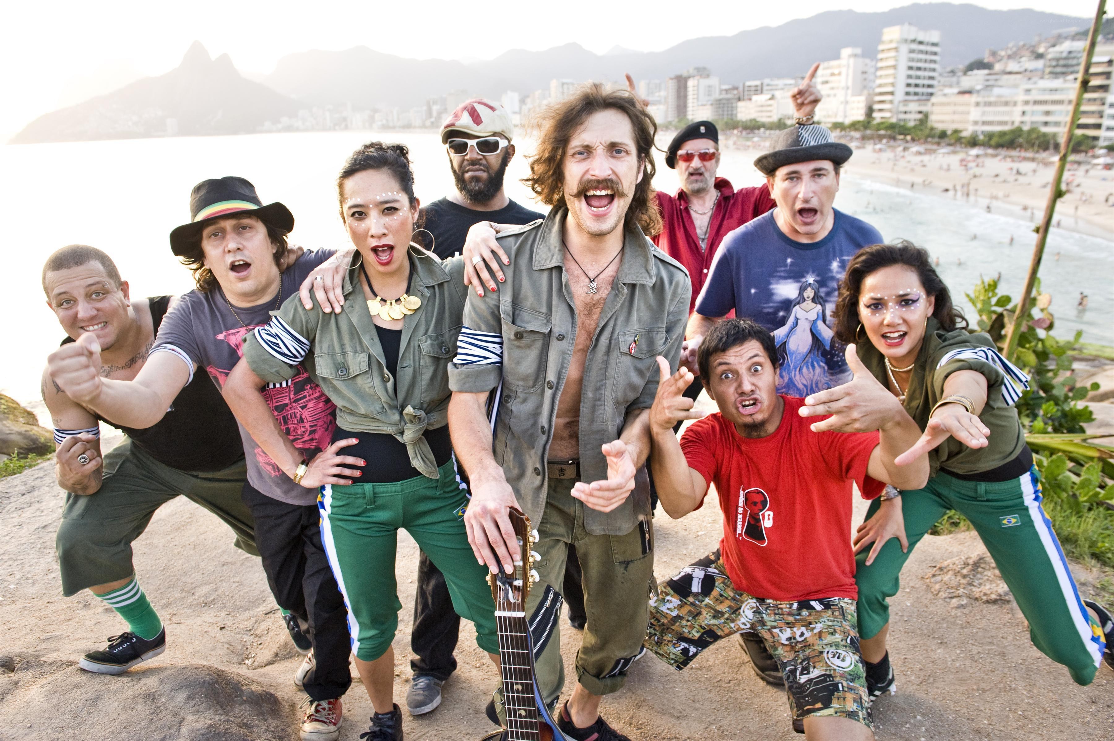 Band posing on beach