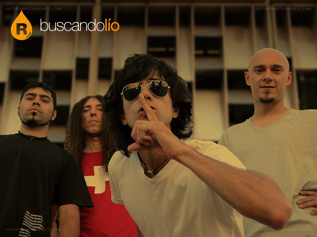 band posing with shushing gesture