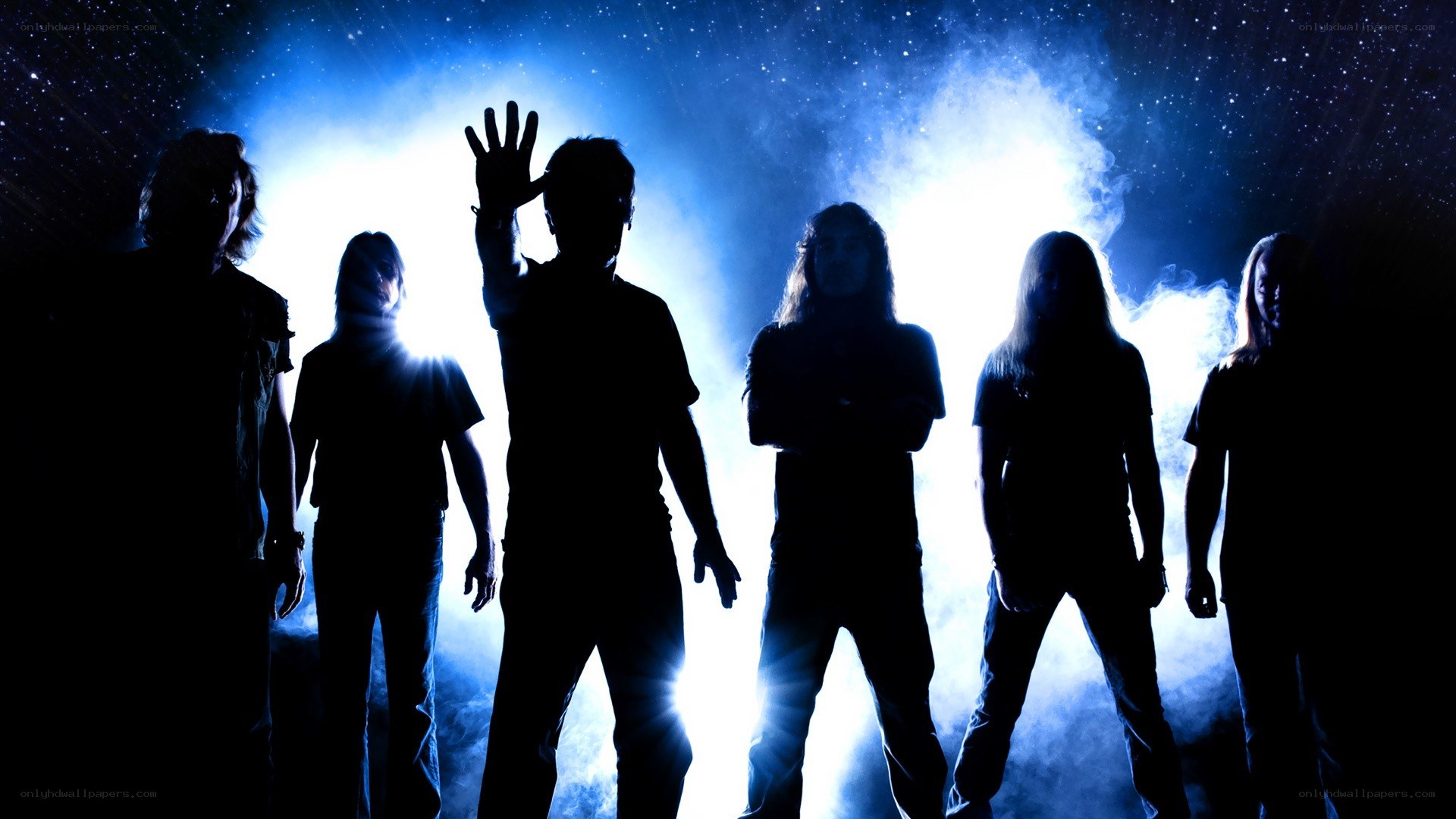 band silhouettes on stage