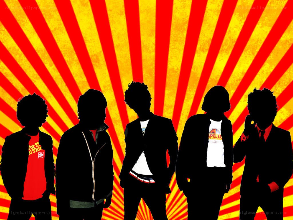band silhouettes on sunburst background