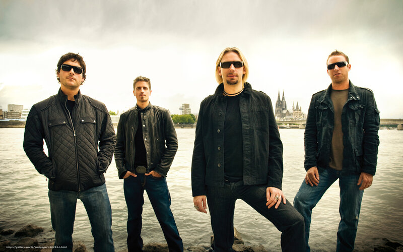 band standing by river
