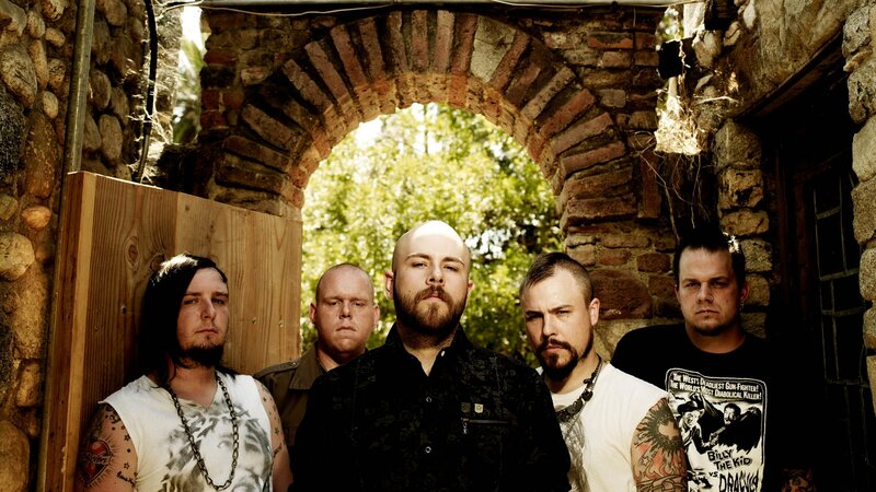 band standing in stone archway