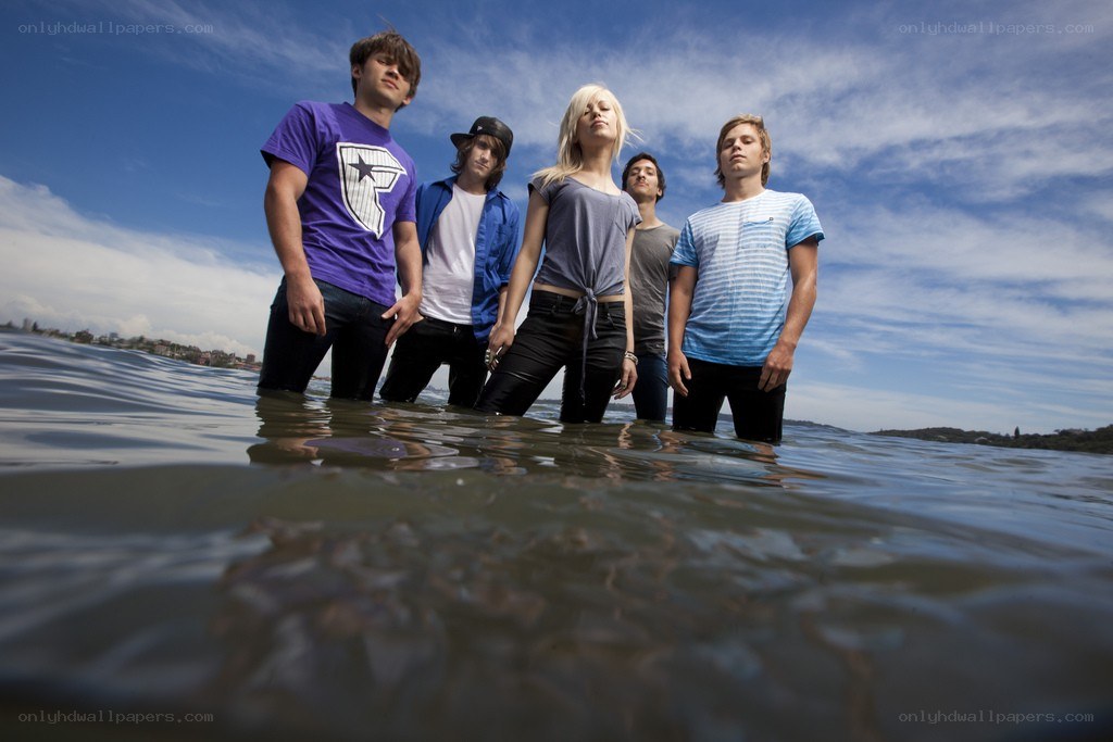 band standing in water
