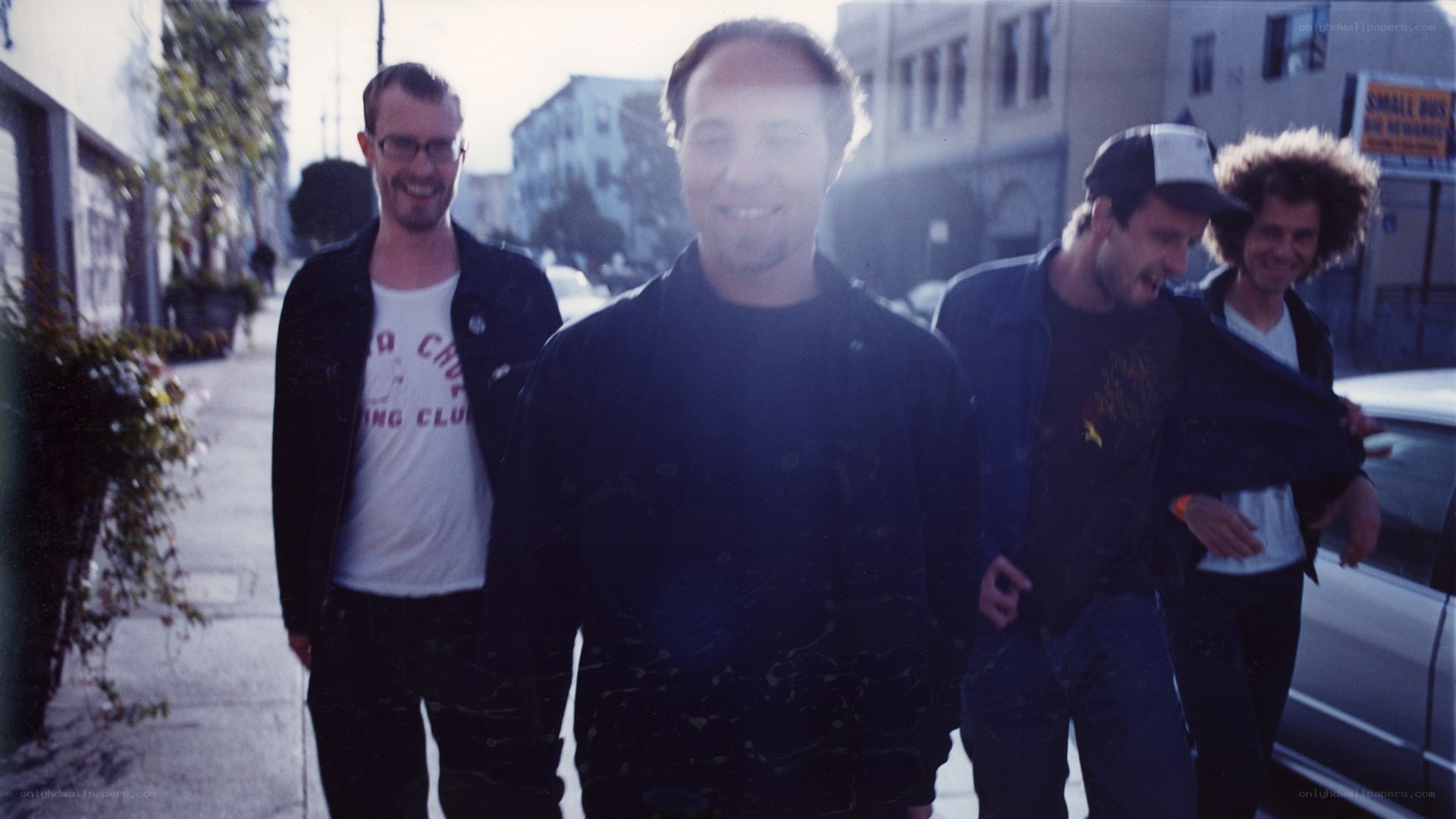 band walking on street