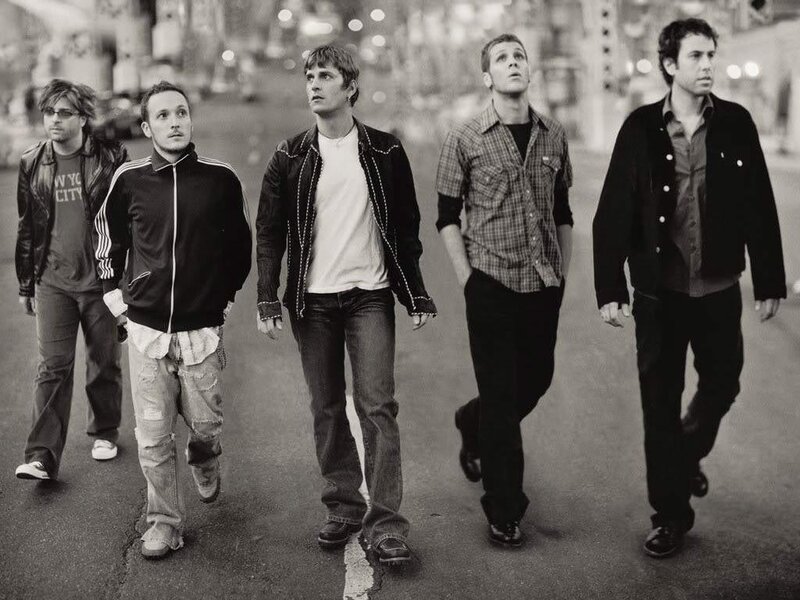 band walking on street