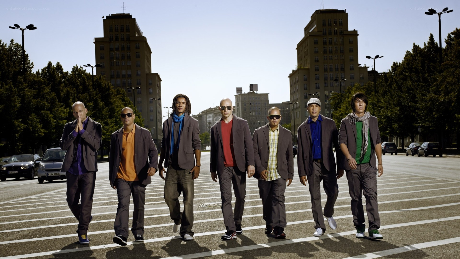 band walking on street