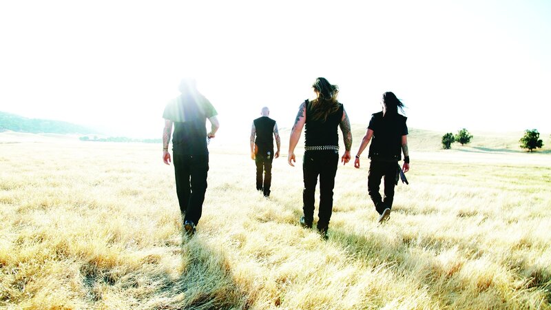 band walking through a field