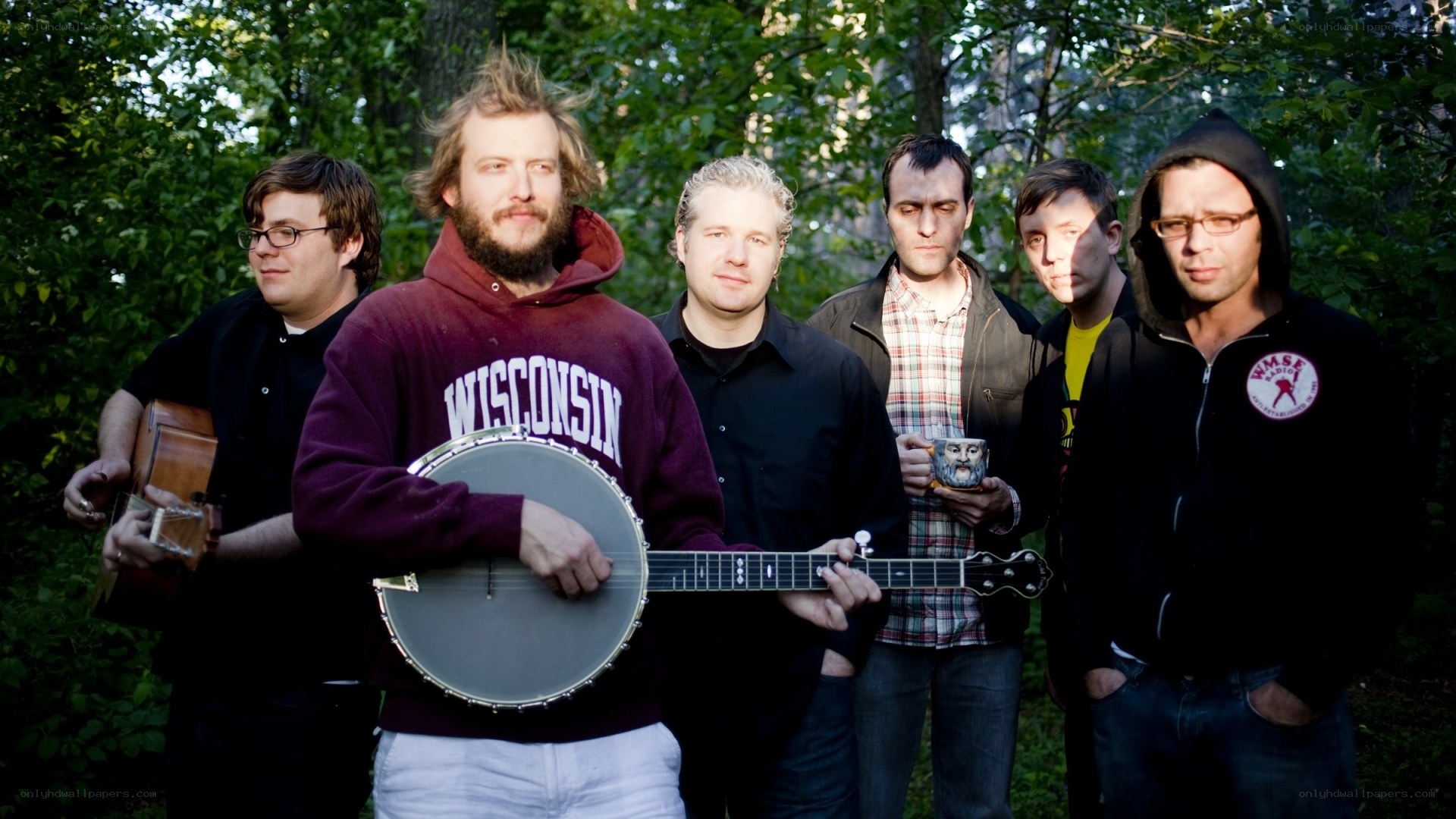 band with banjo in forest