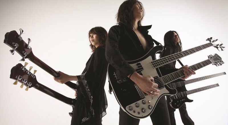 band with bass guitars
