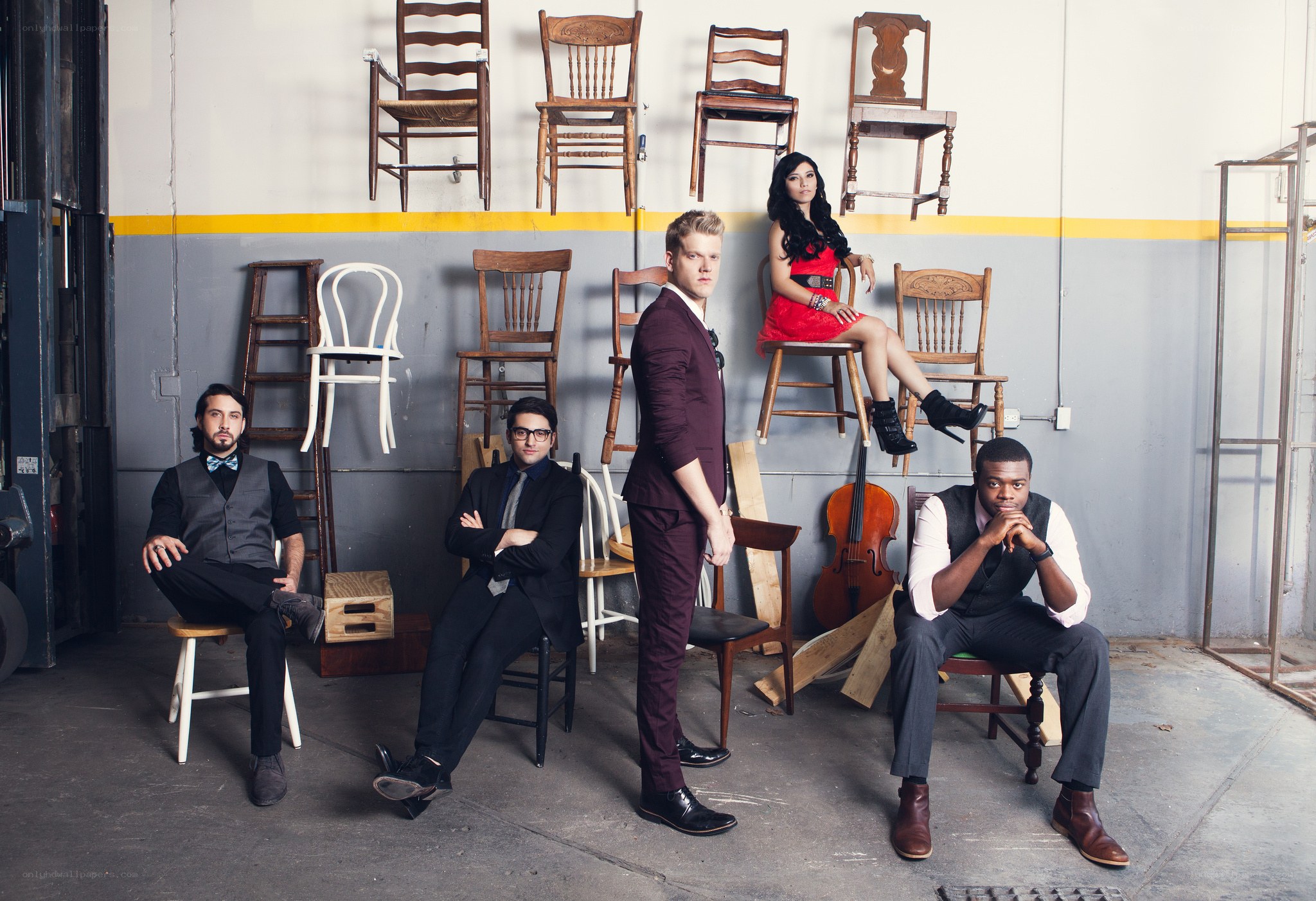 band with chairs in warehouse