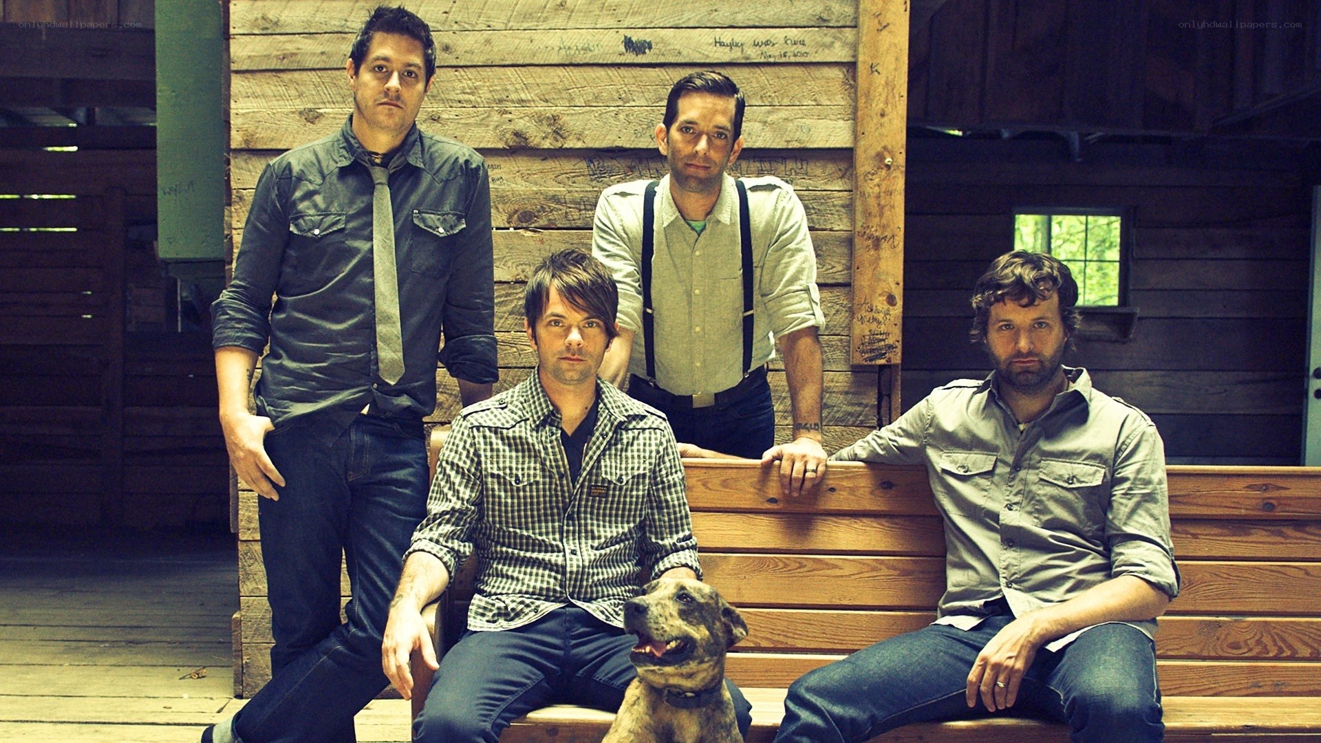band with dog on bench