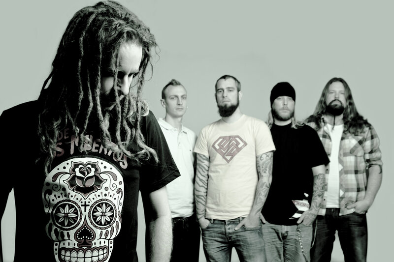 band with dreadlocks and skull t-shirt