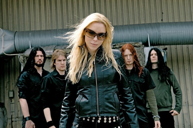 band with female lead in leather jacket
