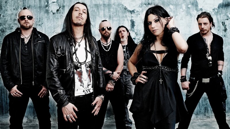 Band with Female Vocalist — Black, Serious, Photograph
