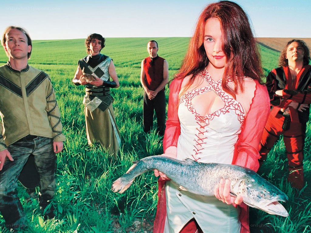 Band with fish in field