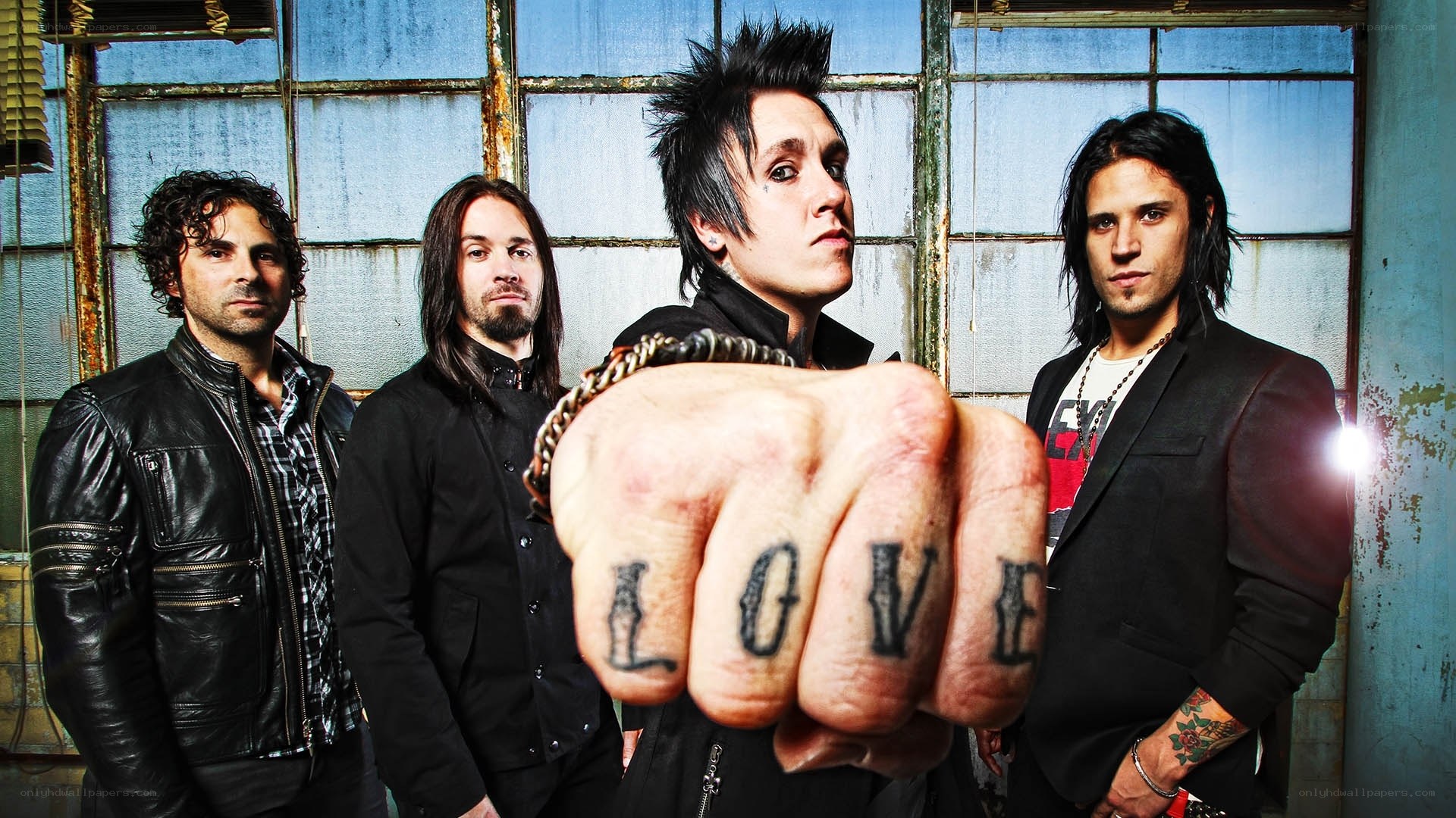 band with fist tattoo