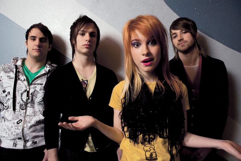 band with four members posing