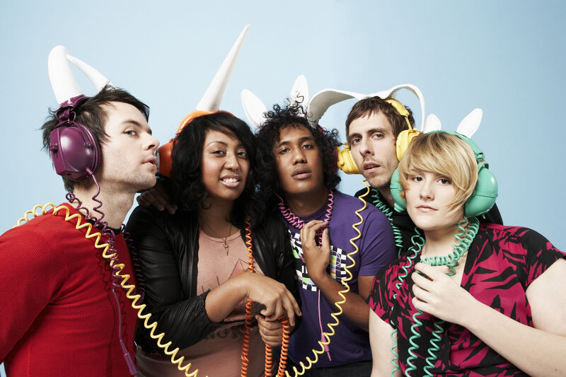 band with headphones and unicorn horns