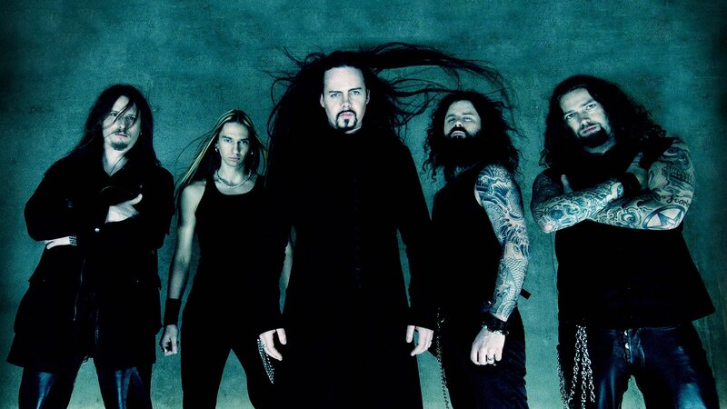 band with long hair and tattoos
