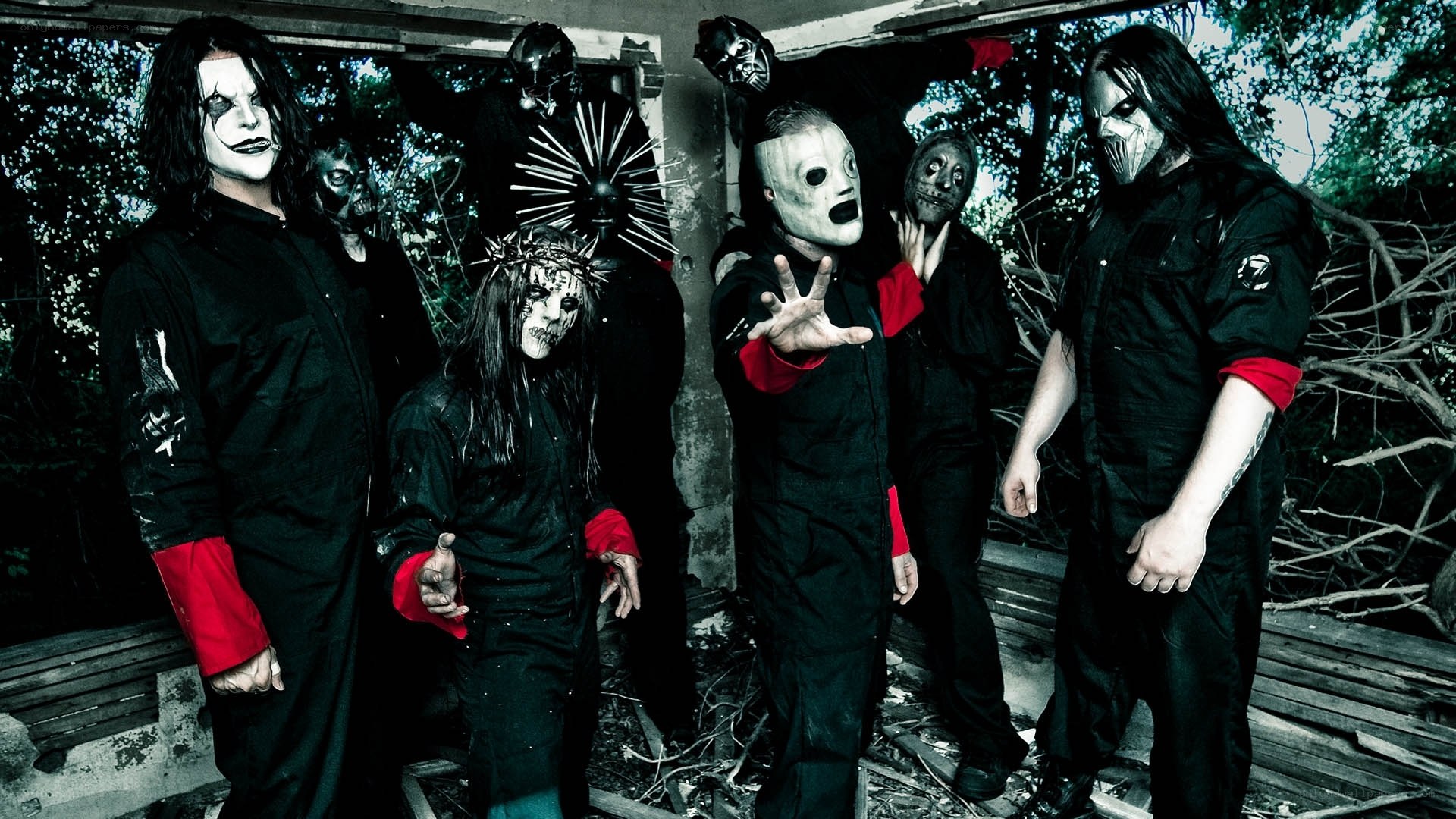 band with masks and dark makeup