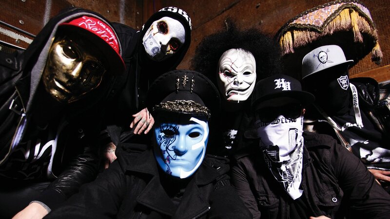 band with masks and hoodies