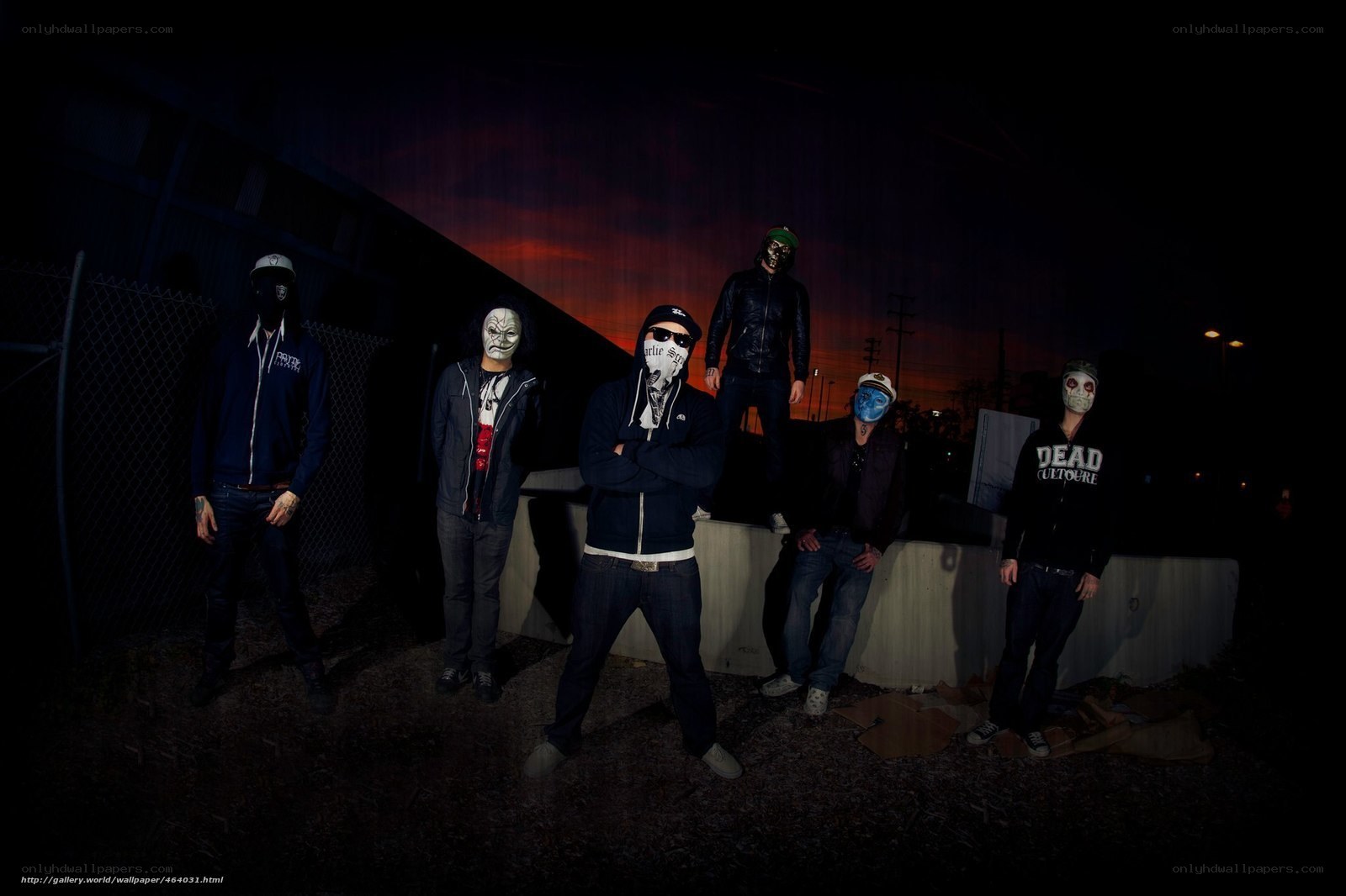 band with masks at night