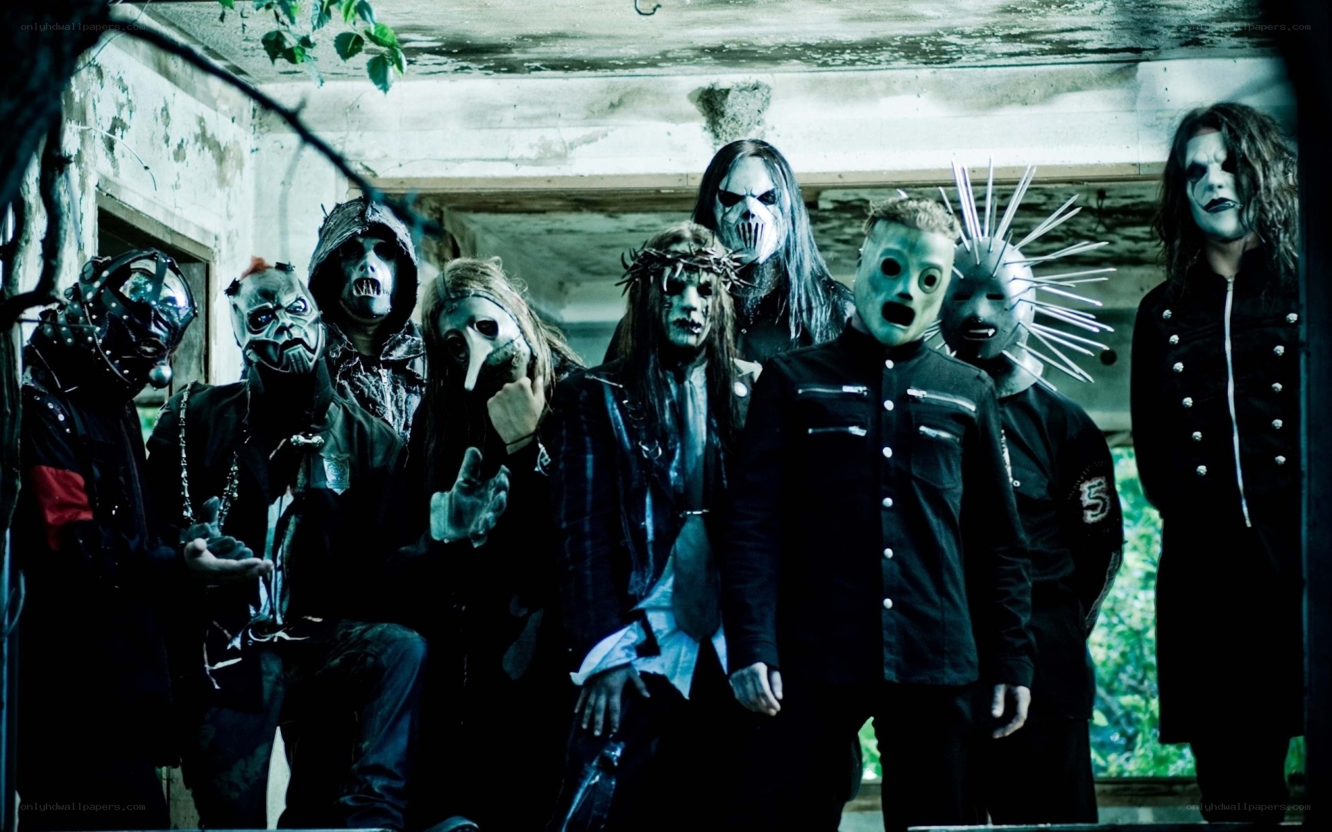 band with masks in abandoned building