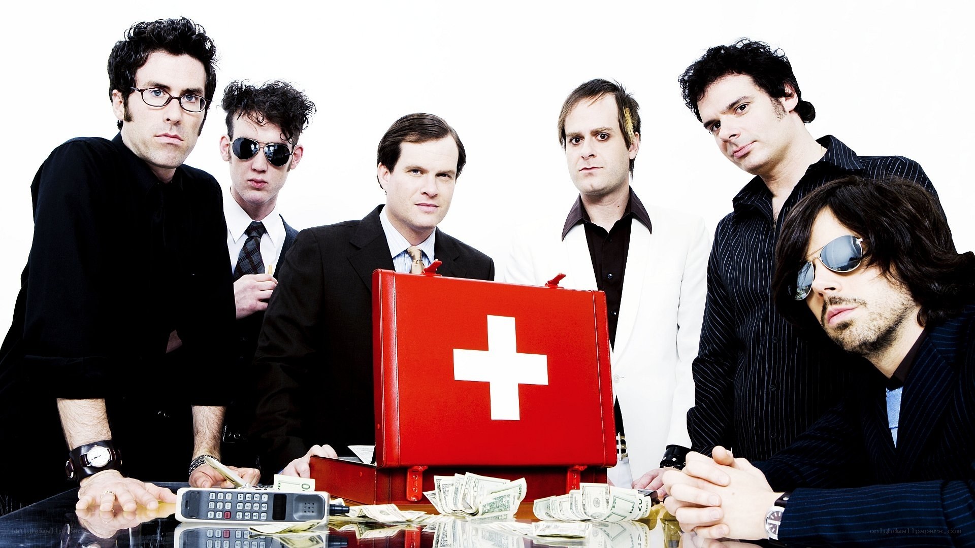 band with medical kit and money