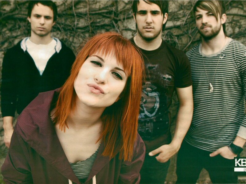band with red-haired woman