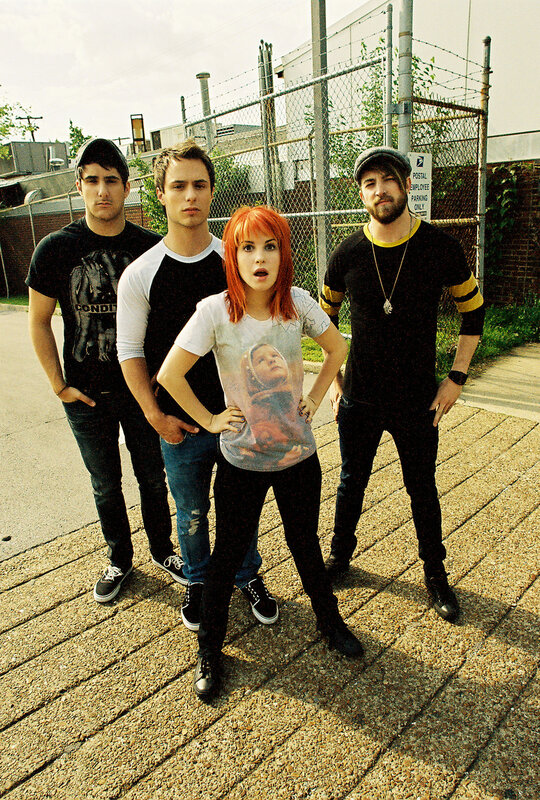 band with red-haired woman