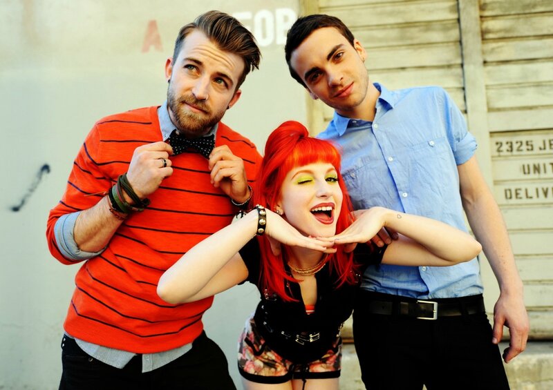 band with red-haired woman